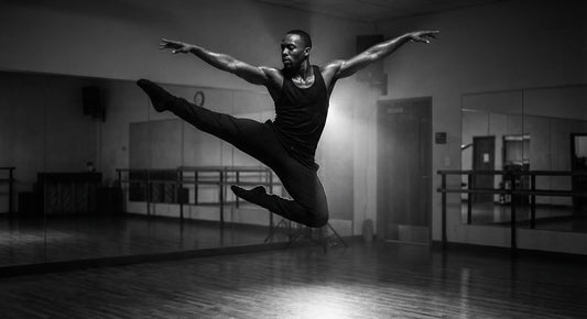 Professional dancer performing intense rehearsal movements demonstrating peak athletic performance and hydration needs