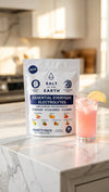 Salt of the Earth variety pack on a kitchen counter with a pink drink
